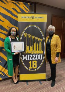 Kennedi Keyes and Cheri Ghan with Mizzou 18 banner