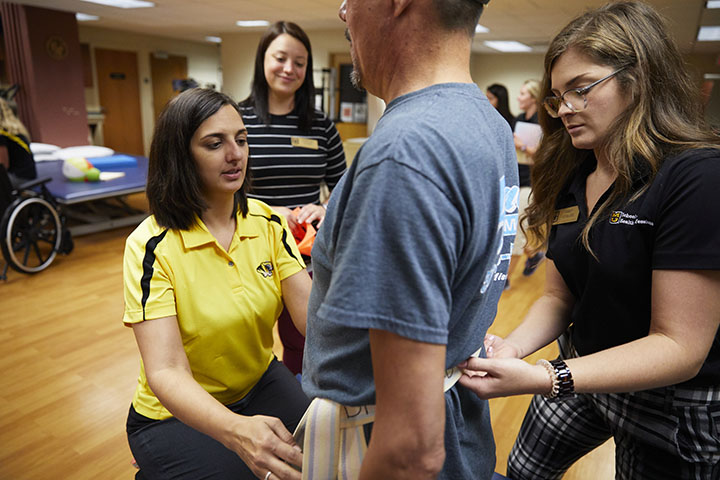 Physical Therapy students perform therapy services in PhysZOU, under the supervision of faculty member Anita Campbell
