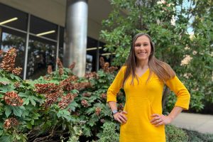 Anna Boone stands outside of Clark Hall