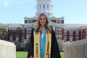 Anna Werr, a recent graduate of the Diagnostic Medical Ultrasound program at Mizzou, stands outside of Jesse Hall.