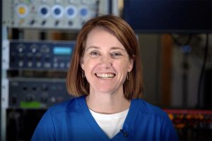 Teresa Pitts stands in a lab