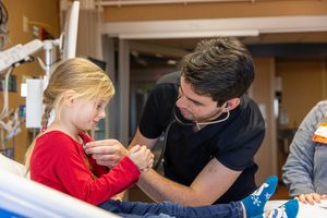 Respiratory Therapy student working with young girl